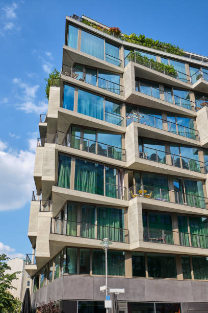 istock Contemporary apartment building with floor-to-ceiling windows 1193649861