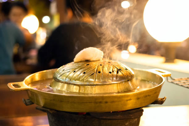 istock Iron pan for barbecue grill with hot pot making at the same time. Street buffet thai style. 1193651073