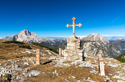 War memorial on Monte Piana in front of Hohe Gaisl and Duerrenstein mountain, Dolomites, Italy