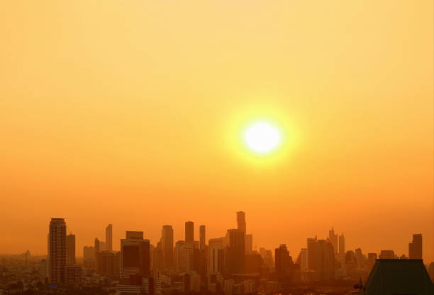 istock The bright sun rising over the city with copy space 1193654742