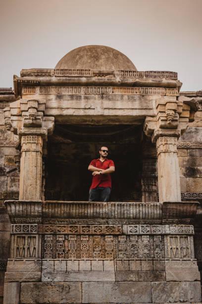 istock Man at Heritage Jami Masjid, Champaner 1193656482