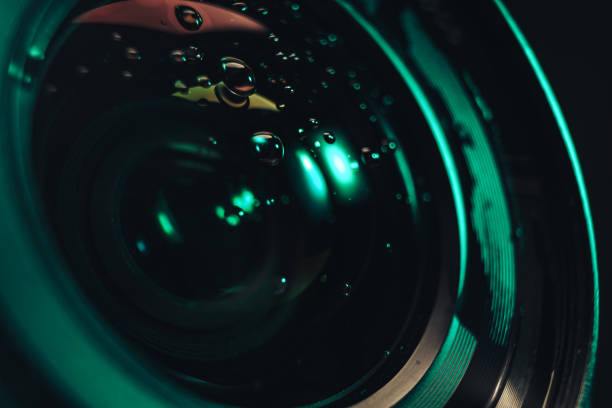 istock Close up beautiful Camera lens of drop water, aqua menthe light. Background pattern for design. Macro photography view. 1193660549