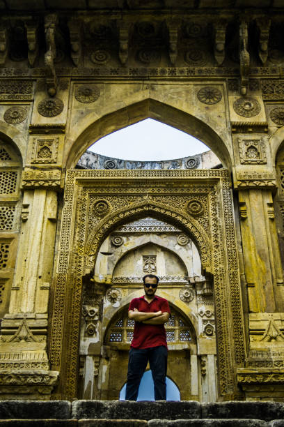 istock Man at Heritage Jami Masjid, Champaner 1193661805