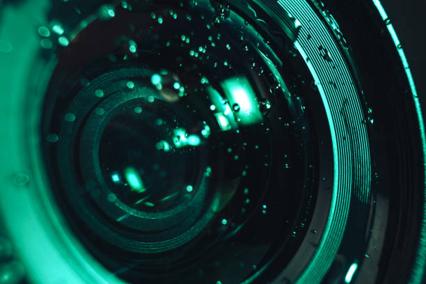 istock Close up beautiful Camera lens of drop water, aqua menthe light. Background pattern for design. Macro photography view. 1193661821