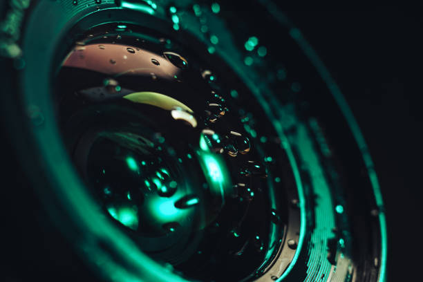 istock Close up beautiful Camera lens of drop water, aqua menthe light. Background pattern for design. Macro photography view. 1193661886