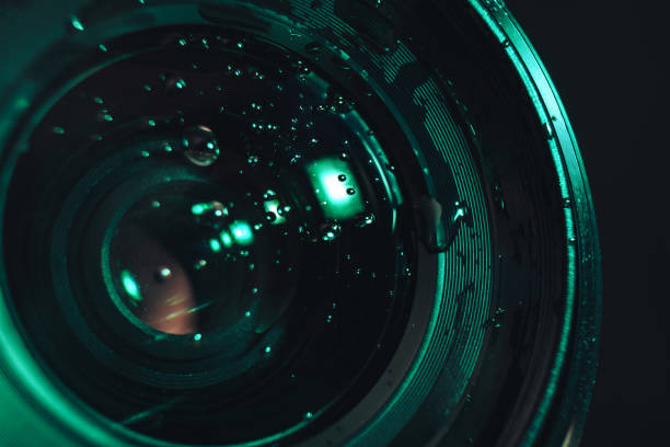 istock Close up beautiful Camera lens of drop water, aqua menthe light. Background pattern for design. Macro photography view. 1193661923