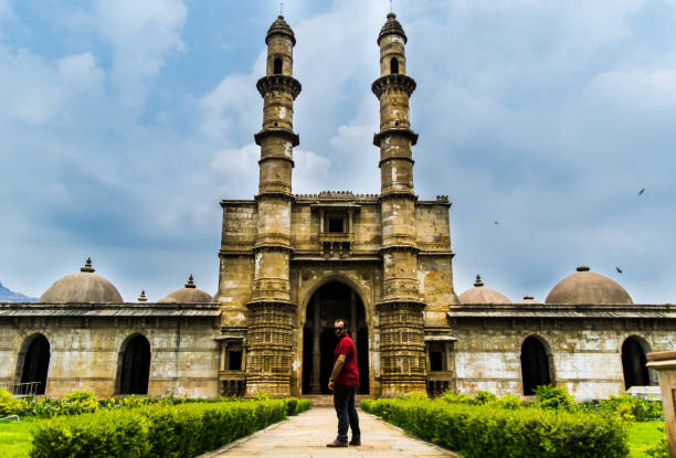 istock Man at Heritage Jami Masjid, Champaner 1193662772