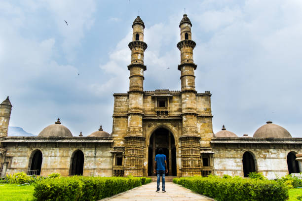 istock Man at Heritage Jami Masjid, Champaner 1193662778