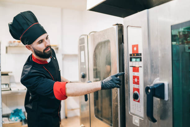 istock Chef preparing food commercial kitchen 1193663826