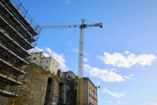 Crane over Old Building, photo taken in the streets of Pozzuoli, Naples, Italy, Europe
