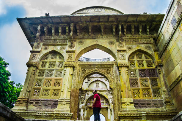 istock Man at Heritage Jami Masjid, Champaner 1193667595