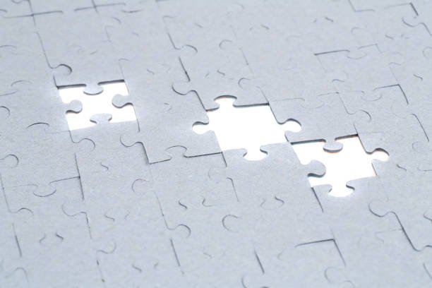 istock Unfinished jigsaw puzzle pieces 1193667952