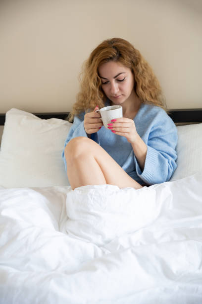 istock Woman in blue sweater 1193668867
