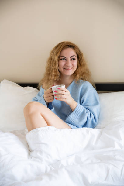 istock Woman in blue sweater 1193668871