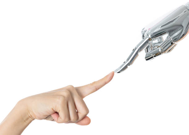 istock Human finger touching robot finger on white background 1193670025