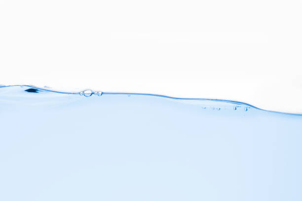 istock Water waves on a white scene isolated the background 1193672033