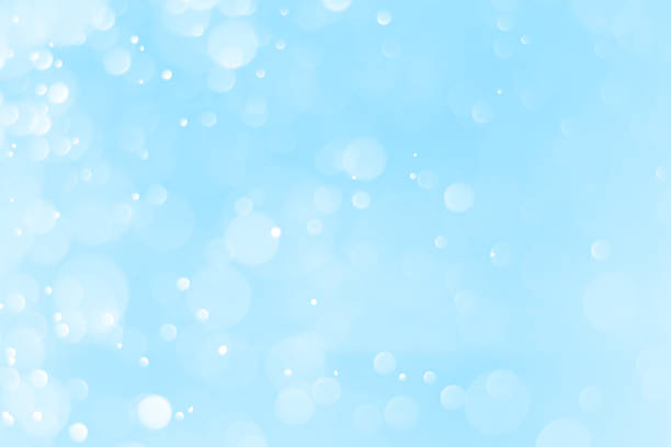 istock Blue bokeh background for christmas backgrounds, sphere of snow. 1193672474