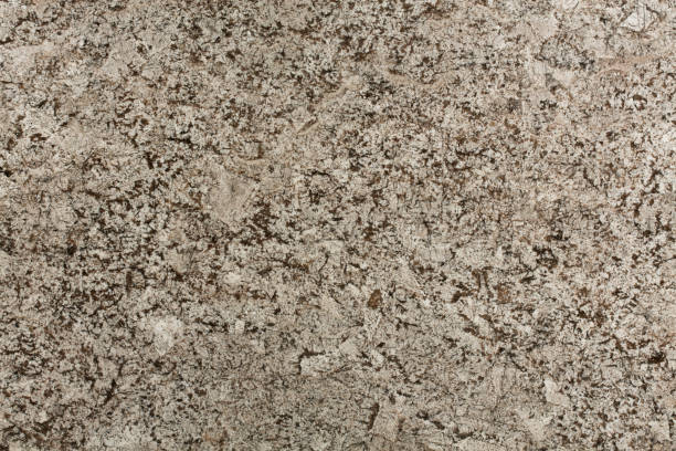 plan rapproché de texture de pierre de granit naturel beige et brun et brun. - gneiss photos et images de collection