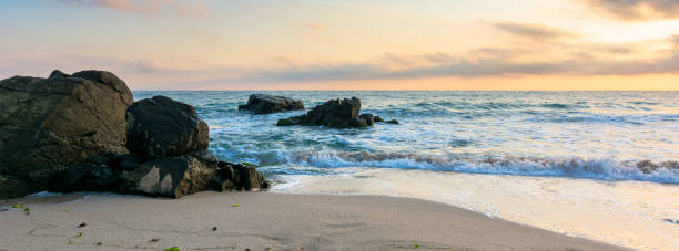 istock sea beach at sunrise 1193678880