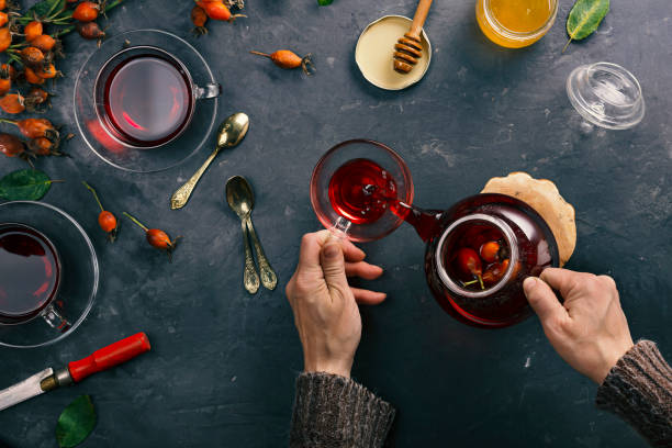 istock Woman is preparing tea from rose hips. 1193681087