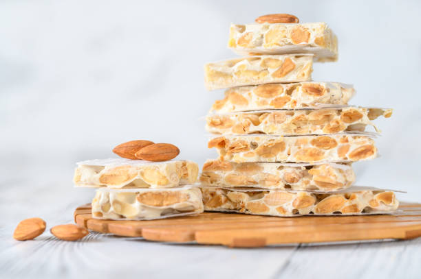 Dessert for Christmas in Spain and other latin american countries, made with toasted almonds, honey, sugar and egg yolk