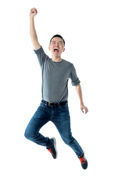 istock Excited man jumping on white background 1193683076