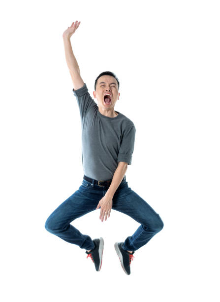 istock Excited man dancing on white background 1193683332