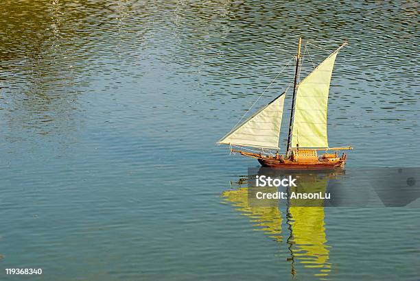 Handmade Remote Control Sailboat On Lake Stock Photo - Download Image Now - Activity, Child, Cold Drink