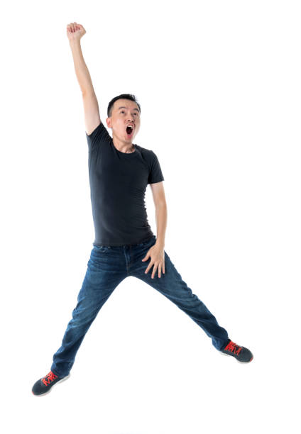 istock Excited man jumping on white background 1193683630