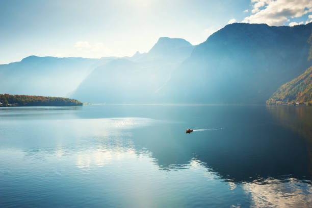 istock Boat floating on the Hallstatter lake in Alps, Austria 1193685546