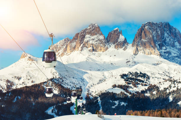 Ski lift on ski resort in winter Dolomite Alps. Val Di Fassa, Italy. Winter holidays