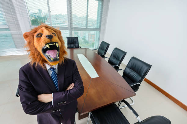 istock Businessman wearing a mask in board room 1193686608
