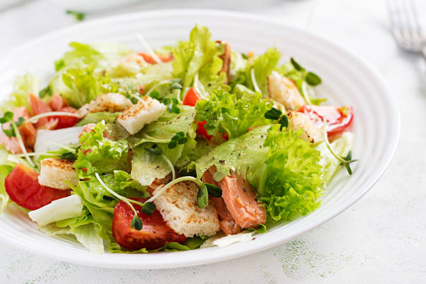 istock Caesar Salad with Salmon. Fish menu. Seafood - salmon. 1193687150