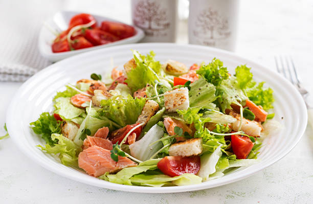 istock Caesar Salad with Salmon. Fish menu. Seafood - salmon. 1193687162