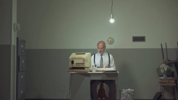istock Sad businessman working in a small office 1193687456