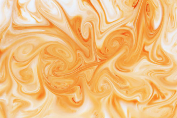 istock coffee and milk mixing abstract or marbled chocolate watercolor texture background 1193689965