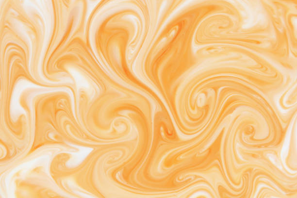 istock coffee and milk mixing abstract or marbled chocolate watercolor texture background 1193689966