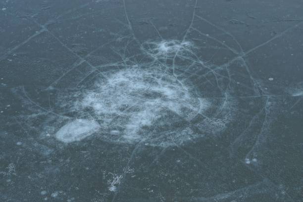 istock texture of gray ice and white cracks 1193696204