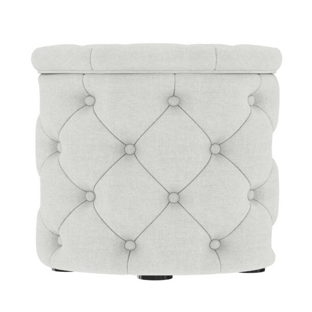 istock Quilted white fabric oval pouf on an isolated background. Front view. 3d rendering 1193697102