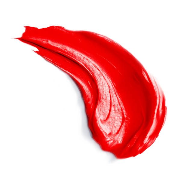 red makeup smudge isolated on white. liquid lip gloss swatches. cosmetics bb cosmetic cream . twisted lipstick smear. skin tone cc cream. grooming products. foundation strokes - lipstick make up cosmetics grooming product imagens e fotografias de stock