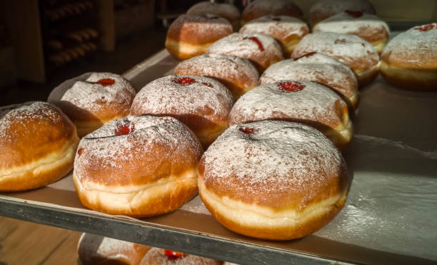istock Festive sweet donuts  on market place 1193697913