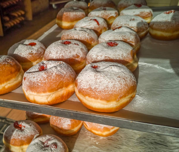 istock Festive sweet donuts  on market place 1193698009