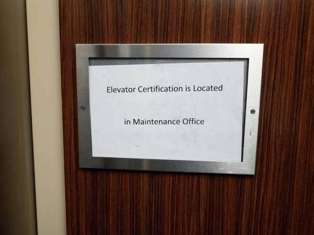 istock paper elevator certification is located in maintenance office sign 1193698617