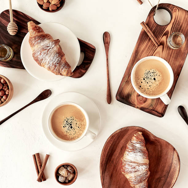 istock breakfast pattern, croissant, coffee, honey, cinnamon sticks, nuts, sugar. Good morning concept. 1193700371