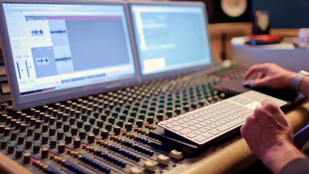 istock Sound technician monitoring sound mixing console 1193701636