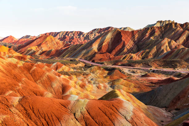 istock Winding highway through the rainbow mountain, Gansu, China . 1193703997