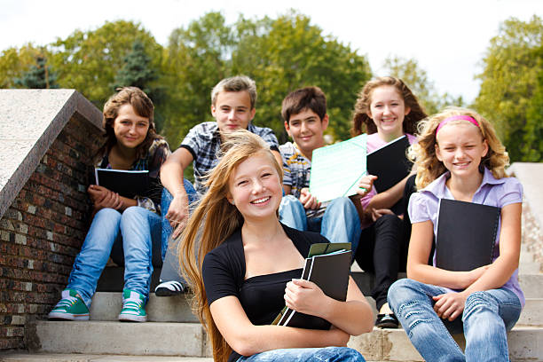 istock Teenagers with books 119370443