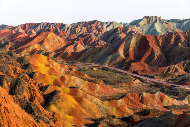 istock Winding highway through the rainbow mountain, Gansu, China . 1193704777