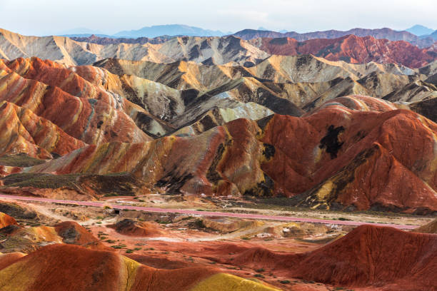 istock Winding highway through the rainbow mountain, Gansu, China . 1193704798