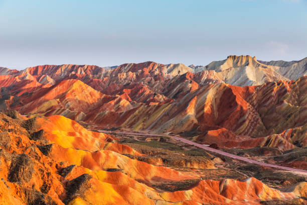 istock Winding highway through the rainbow mountain, Gansu, China . 1193704804